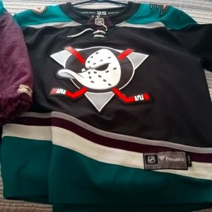 Mighty ducks jersey and varsity jacket along with the Snapback to go with it.